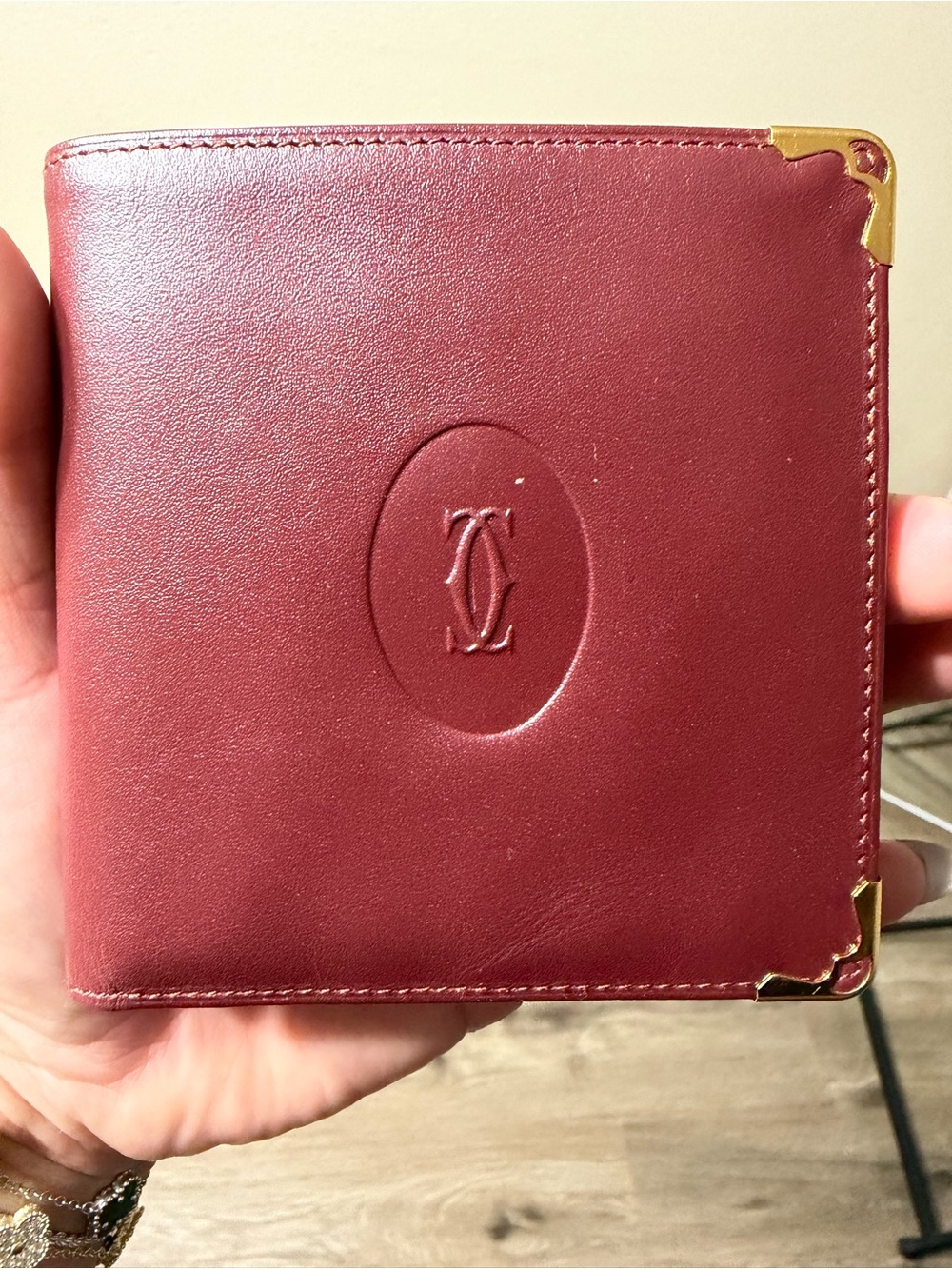 Cartier Burgundy Leather with Gold Corners Unisex bifold wallet